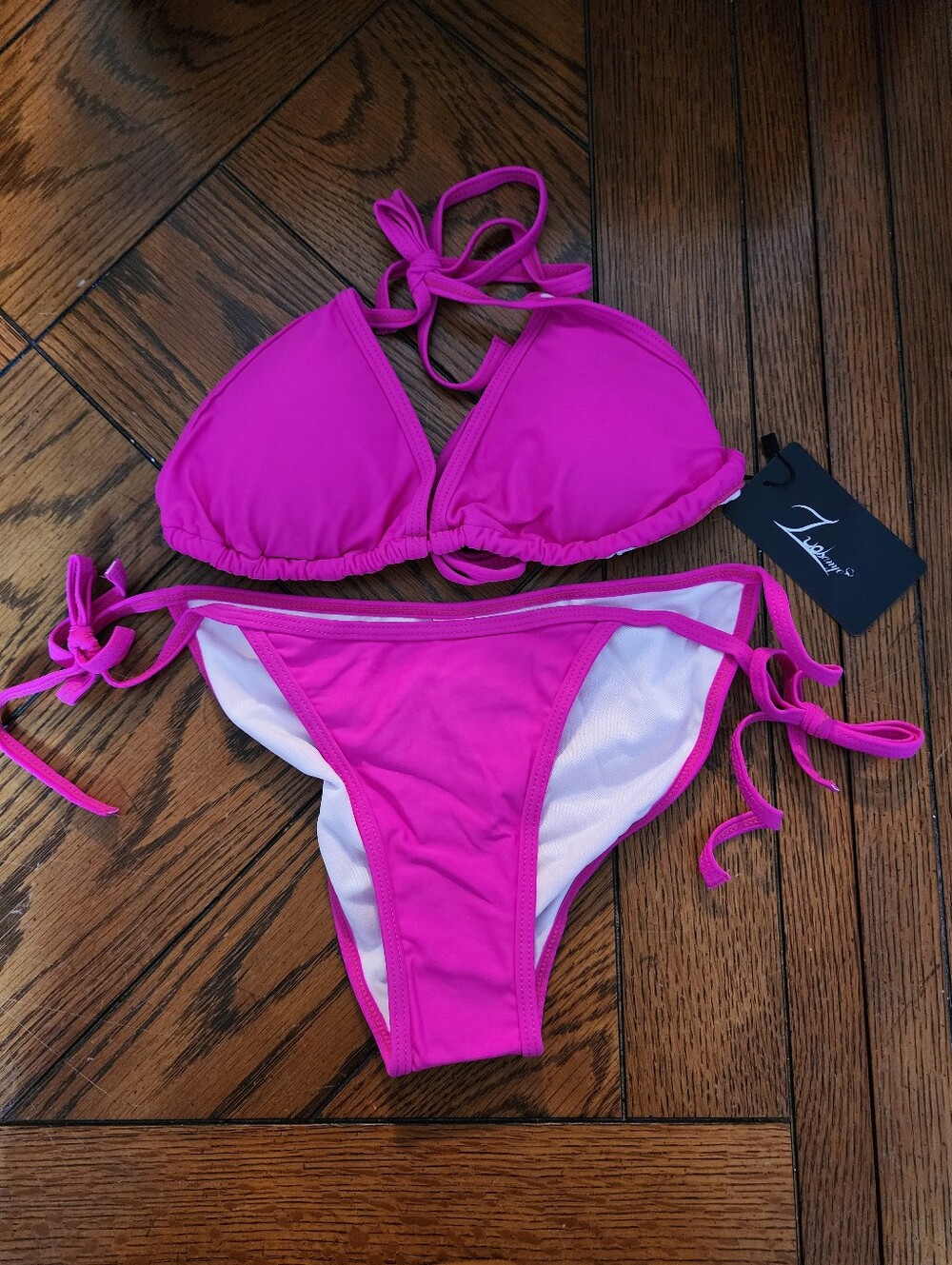 S004-12 Pc Small bikini variety box. 12 brand new swimsuits. Various brands.